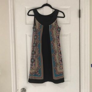 Single dress. Black patter silk. Fits nice.